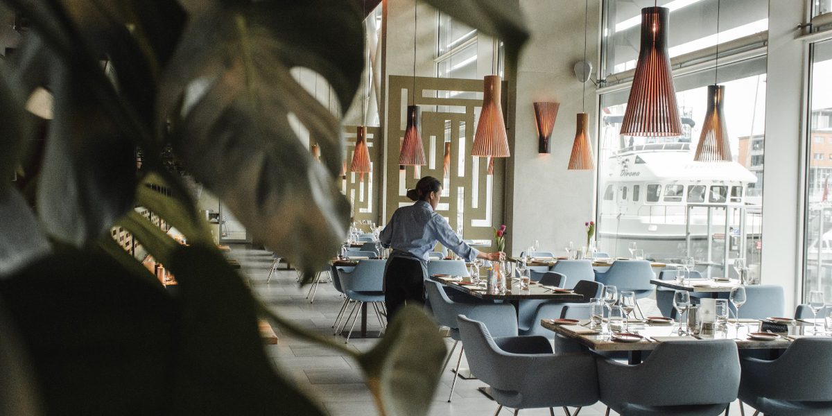 food and beverage manager setting up for service