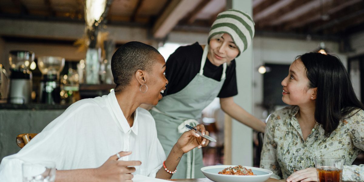 food and beverage manager doing customer service